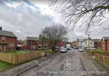 Man arrested after being seen trying car doors in Darwen