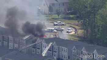 Fire burns through townhome in Raleigh