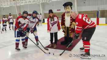 OPP officers and Alliston students battle on the ice for a good cause