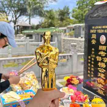 Michelle Yeoh takes Oscar trophy to visit father's grave in Malaysia
