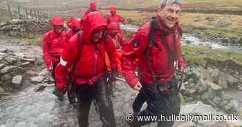 Good Samaritans stage rescue on England's highest peak using gate as a stretcher