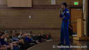 Louisville Middle School alumnus inspires students to new heights