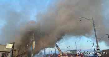 Huge fire burns at commercial complex on Stony Plain Road in west Edmonton