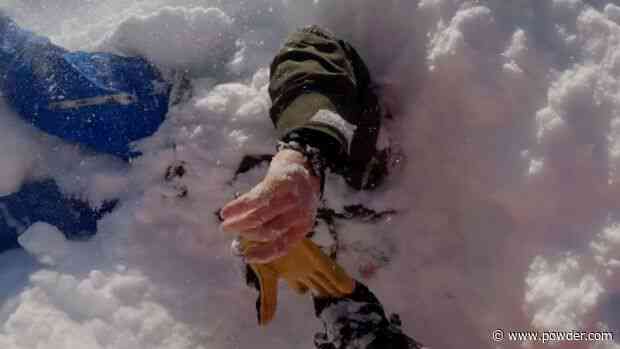 WATCH: Snowboarder Springs Into Action To Rescue Friend From Snow Immersion