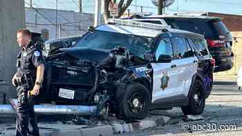Fresno police officer knocks over street light after crash while responding to call