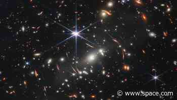 How do we know how far away and early in the universe galaxies are?