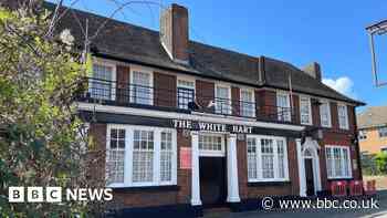 Pub banned from awards for displaying golly dolls