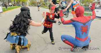 Superheroes take to the streets of Wheaton in 5K Fun Run