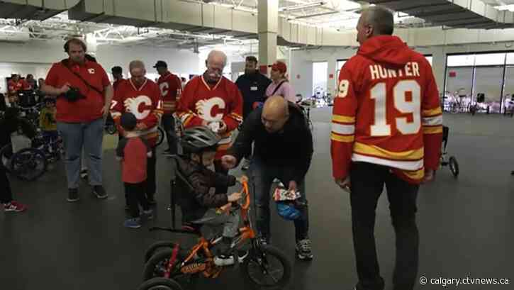 Flames alumni offer support at adapted bike event