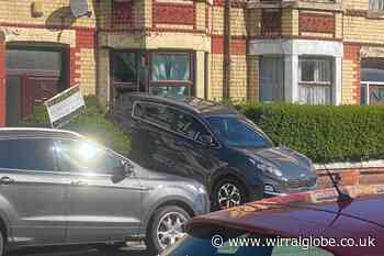 Elderly driver crashes car into front of house in Seacombe