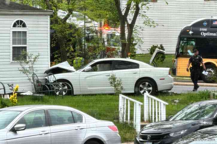 Car runs into house, another overturns in Sunday crash