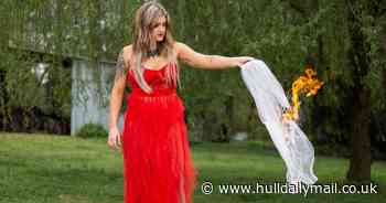 Woman celebrates divorce by burning her wedding dress