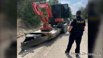 Stolen mini excavator dumped but pickup driver fled the scene