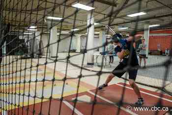 These players love baseball so much, they're practicing in a basement