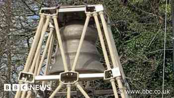 Bell being put in sea near Par to highlight sea levels