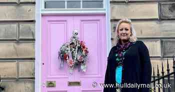 Mum repaints pink front door after being threatened with £20,000 fine