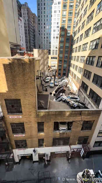 People reportedly trapped in parking garage collapse in downtown New York City, officials say