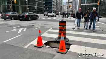 Sinkhole opens up at busy downtown Toronto intersection that closed earlier this year