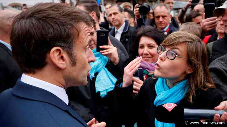 French hecklers call for President Emmanuel Macron's resignation during 'crowd bath'