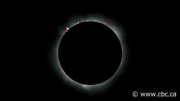 Rare hybrid solar eclipse delights sky watchers