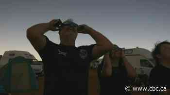 A total eclipse wins cheers and draws tears in  Australia