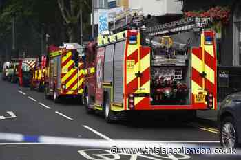 Around 60 people flee fire at block of flats in Bow