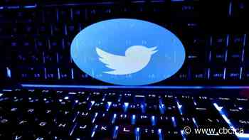 Twitter removes 'government-funded media' tags, blue checks