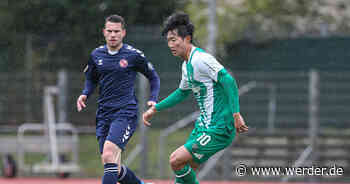 Kickers Emden vor der Brust