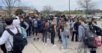 St. Charles North students walk out of class in support of teachers being transferred