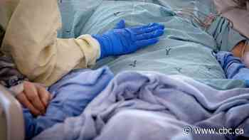 Manitoba reports 13 more COVID-19 deaths, 1st increase in over a month