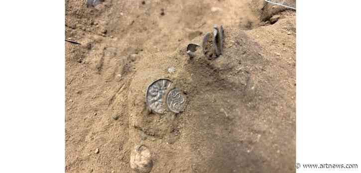 Amateur Archaeologist Finds Ancient Silver Coins Near Viking Castle in Denmark