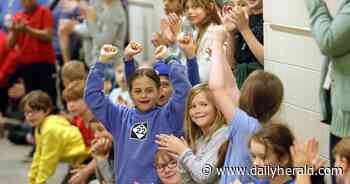 Mount Prospect school aims to knock down hunger, domino style