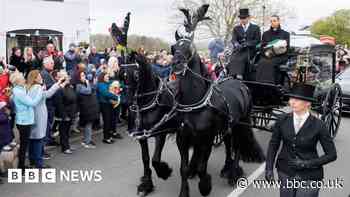 Paul O'Grady: Stars, fans and dogs turn out to say farewell at funeral