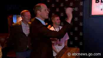 WATCH:  Prince William, Kate play game of darts with others at Birmingham pub