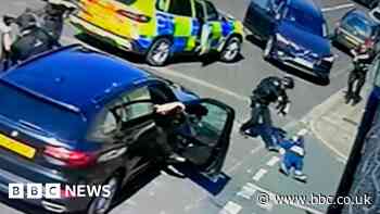Moment man sent flying by police car in Grimsby arrest