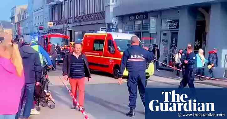 Car drives into crowd at French kite-flying festival, injuring ten