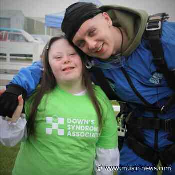 Aitch completes 15,000ft Skydive for World Down's Syndrome Day