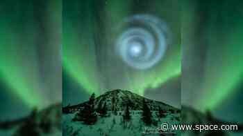 Ethereal whirlpool of light grows into a giant, perfect spiral above Alaska. What was it?