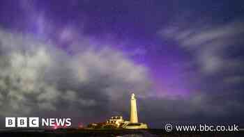 In pictures: Northern lights display sends the skies purple