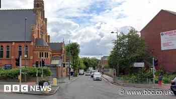 Man held after Birmingham shop worker attacked with hammer