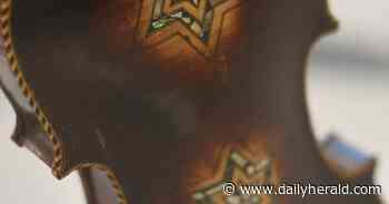 A refrain of 'never again': Violins of Hope exhibit arrives in Elgin, showcasing Holocaust-era instruments