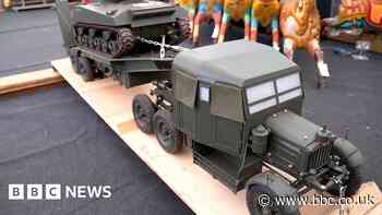 Model Sherman Tank and transporter lorry sells at auction