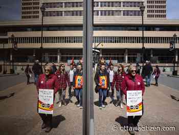 Striking public servants block access to government buildings and key infrastructure