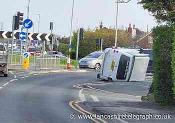 Road closed as car flips on notorious roundabout in rush hour traffic