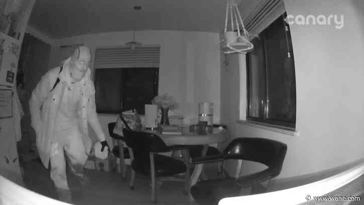 Out-of-town couple watches armed burglar in home on surveillance camera