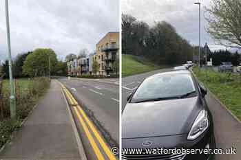 Row as Red Lion Lane yellow lines painted in Kings Langley