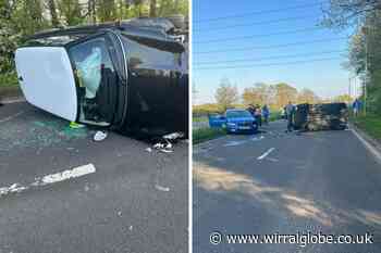 Two vehicle crash on Parkgate Road sees car flip onto side