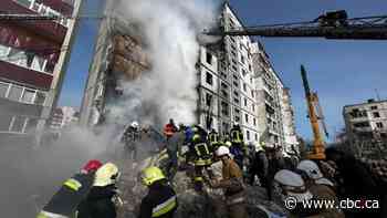 Russian missile attacks on Ukrainian cities kill at least a dozen people