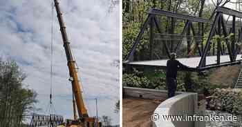 Pettstadt: Großer Kran bringt neue Brücke in Position - zweiter Bürgermeister testet Standsicherheit