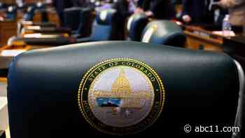 Colorado governor signs gun control bills after massacre, raises minimum age to buy firearms